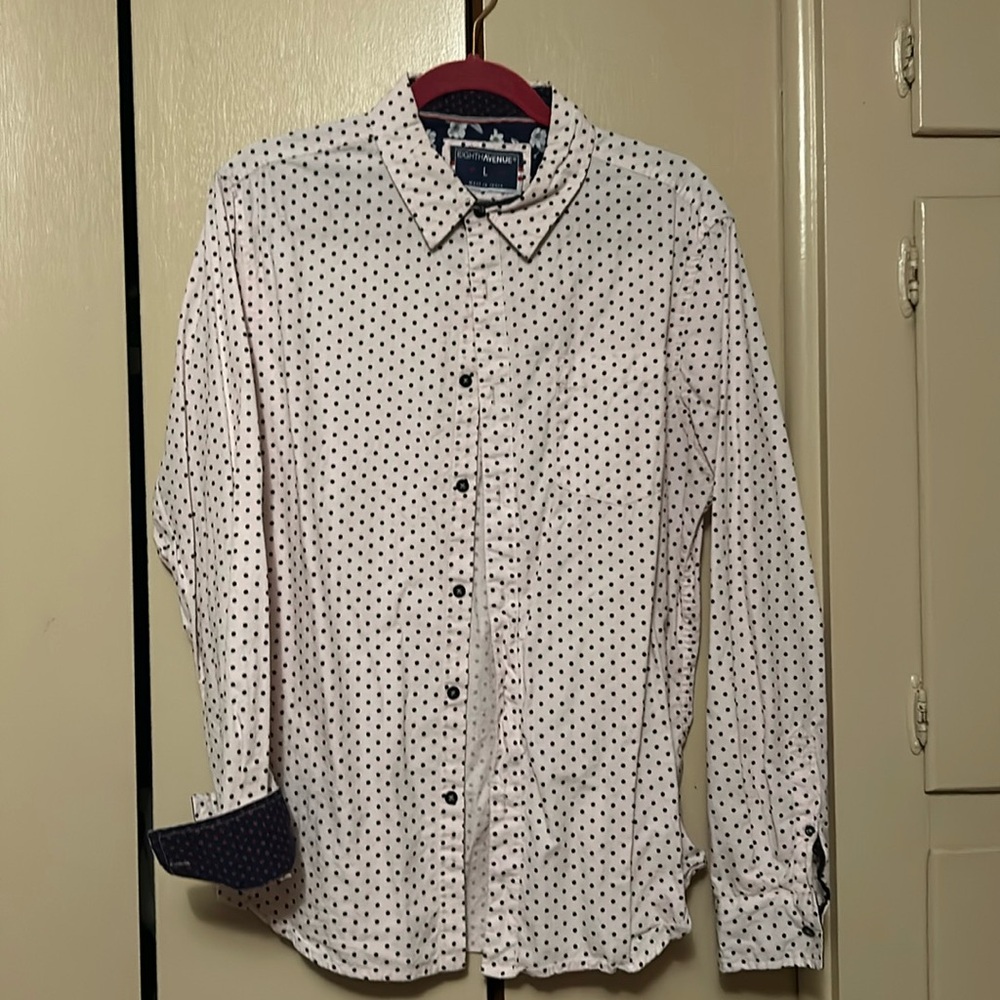 Light pink and black polkadot shirt